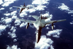 An air-to-air front overhead view of two FB-111 aircraft in formation.