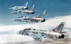 Formation of four F-100Cs (S/N 54-2105, 54-2102, 54-2107, 54-1796). (U.S. Air Force photo)